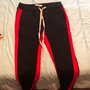 Fashion Nova Black & Red Jeans